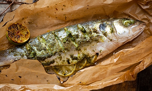Seabass baked in a bag with pesto